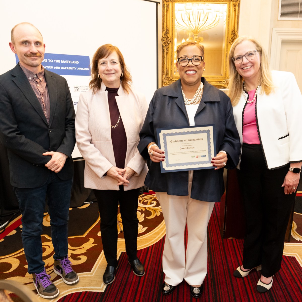 Bank of America President Janet Currie accepts 2025 Community Champion Award